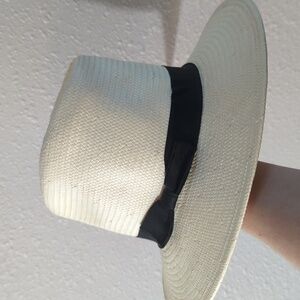 White Express hat with black bow